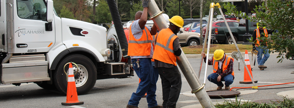 Utility Crew fixing an underground system